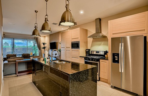 Florida Central Atlantic Coast House | Luxurious home with private elevator, terraces, and paid-access pool