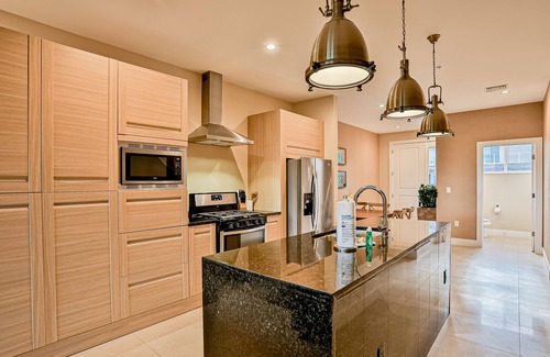 Florida Central Atlantic Coast House | Luxurious home with private elevator, terraces, and paid-access pool