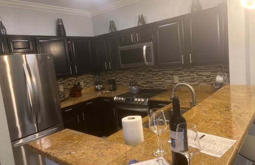 Reunion Condo | Luxurious Living at Your Fingertips with King bed