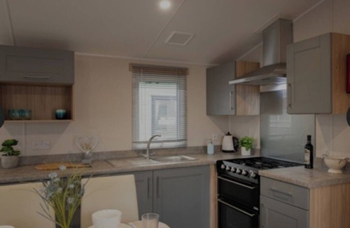 Helston House | Luxurious new 8 berth caravan, Ruan Minor Cornwall -Beach 10 min. 2 decked areas