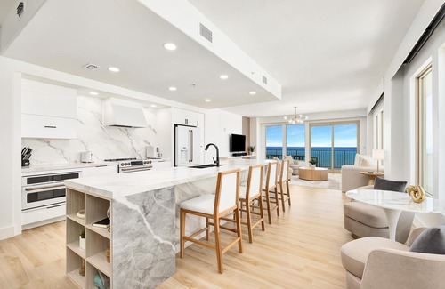 Thomas Drive Condo | Luxurious renovated Gulf-front condo with complimentary Beach Chair Service!