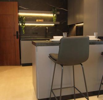 Riyadh Apartment | Luxurious suite with a terrace overlooking KAFD