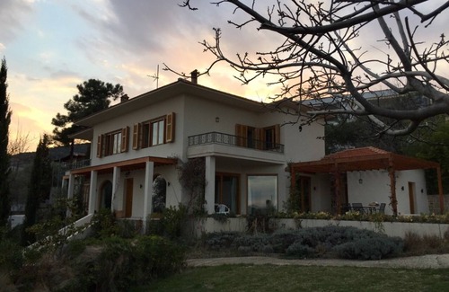 Palaio Tsifliki House | Luxurious Villa, designer's pool, lighted tennis court, olive grove, sea views.