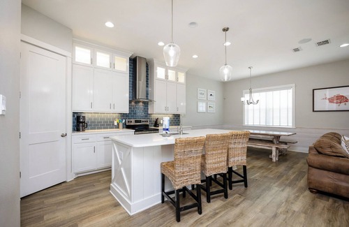 Corpus Christi House | Luxurious Waterfront Retreat with Complex Pool, Boat Slip, & Close to Beach