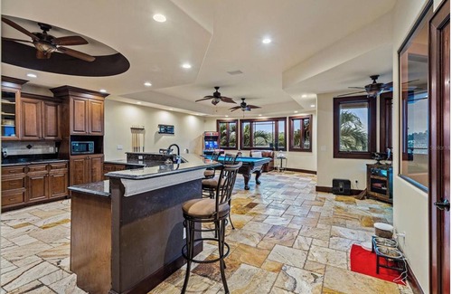 Causeway Isles House | Luxurious Waterfront Mansion! Minutes to the Beach!