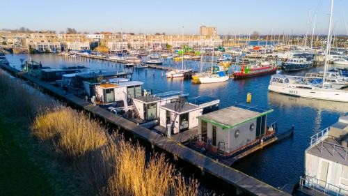 Zeewolde Boat Rental | Luxurious waterloft near beach and centre by Weltevreden Experience