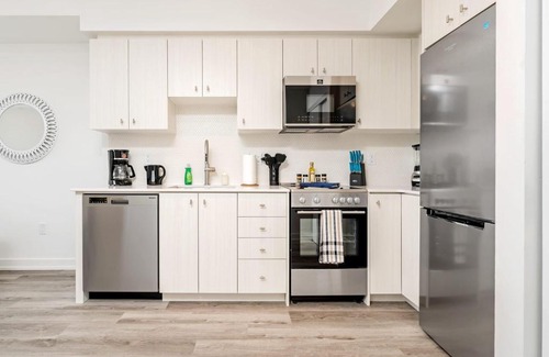 Kitchener Apartment | Luxury 1BR Condo - King Bed & Private Balcony