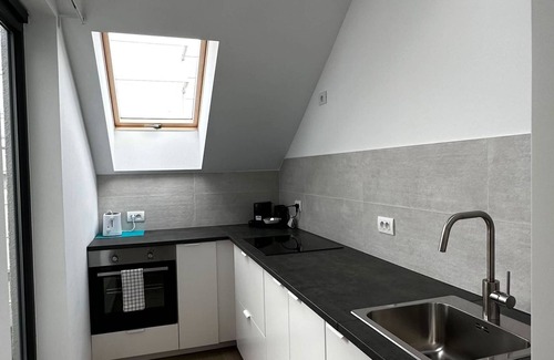 Klein-Antwerpen Apartment | Luxury 1BR Near Fashion District by Oneluxstay