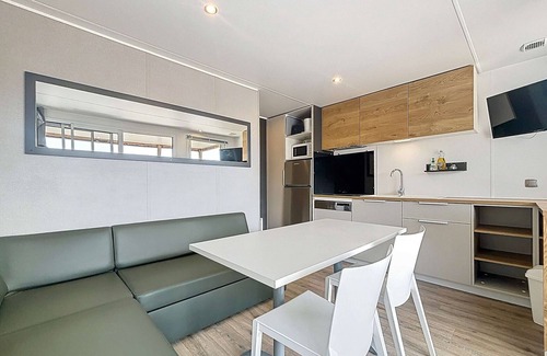 Jullouville-les-Pins House | Luxury 2-Bedroom Mobile Home with Heated Pool, Near Beach, Parking, and Wi-Fi