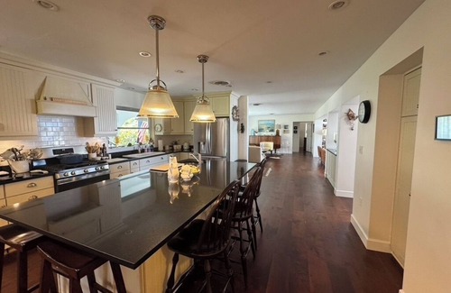 Sarasota House | Luxury 3-bedroom pool home on the scenic Intercoastal, 1 mile from beach access.