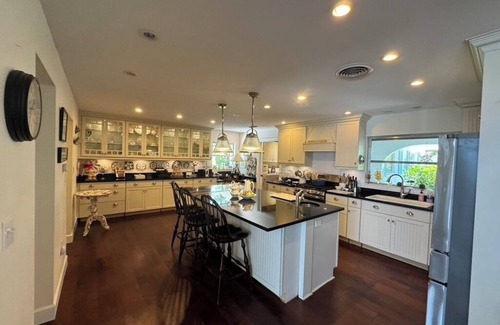 Sarasota House | Luxury 3-bedroom pool home on the scenic Intercoastal, 1 mile from beach access.