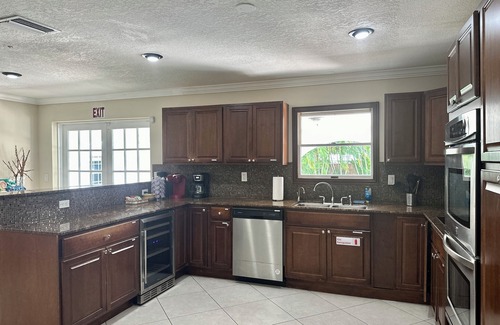 Highland Garden Villa | Luxury 5 Bedroom Art Villa, Heated Pool, Hot tub, Billiards, Grill!