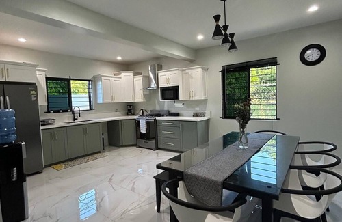 Florence Hall Village Villa | Luxury 5 Bedroom Villa in Gated Community 5 mins to beaches