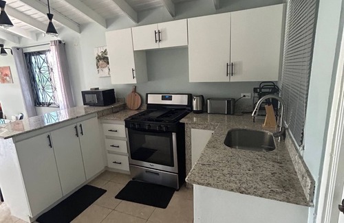 Florence Hall Village Villa | Luxury 5 Bedroom Villa in Gated Community 5 mins to beaches