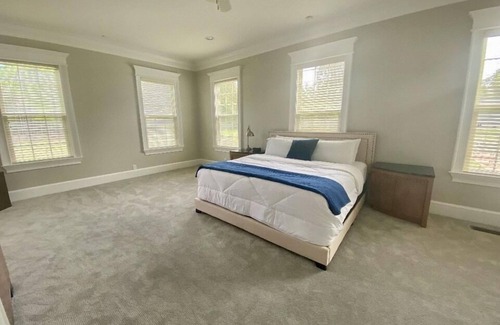 Waverly Resort | Luxury 7 bedroom mansion with horses, pool, hot tub, pond, swings and fire pit!