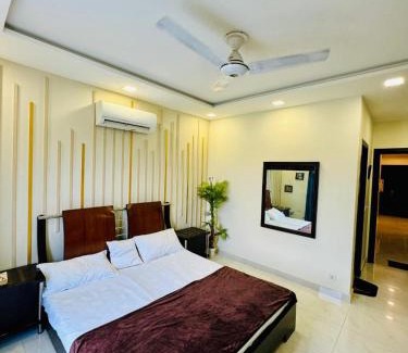Lahore Apartment | Luxury apartment with Pool Gym amenities By The Urban B&B