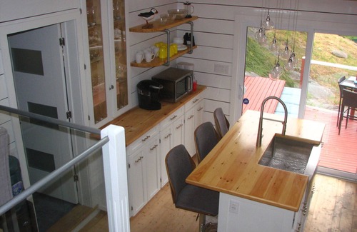 Petty Harbour Cottage | LUXURY APPOINTED RUSTIC COTTAGE VACATION RENTAL in the heart of Petty Harbour