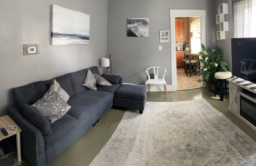 Niagara Falls House | Luxury Cali King Suite · Smart TVs & Wireless Charging in Every Room