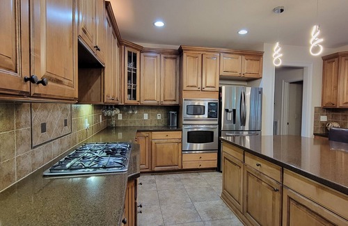 Cary House | Luxury Cary Retreat with Koi Pond & Prime Location
