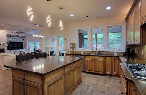 Cary House | Luxury Cary Retreat with Koi Pond & Prime Location