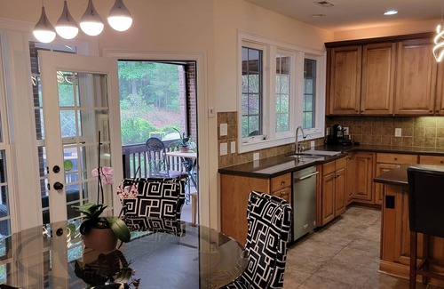 Cary House | Luxury Cary Retreat with Koi Pond & Prime Location