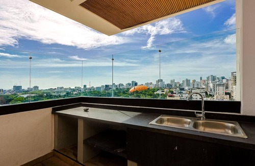 La Arboleda Apartment | Luxury Centric Apt with Pool, Full AC, Fast Wi-Fi, Stunning City Views