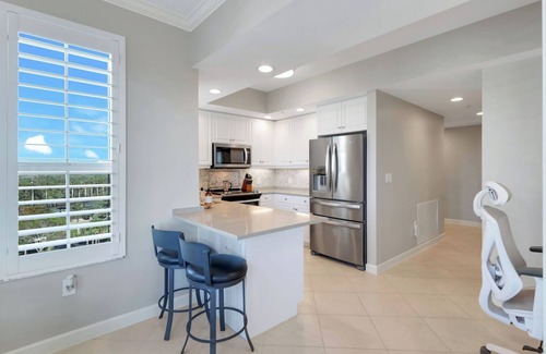 Vanderbilt Beach Condo | Luxury Coastal Elegance in this 3 bedroom condo at The Dunes in Naples