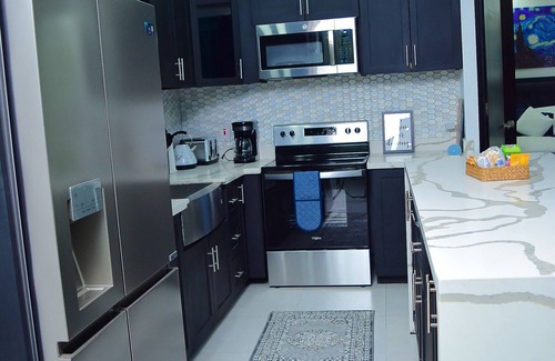 Eden Gardens Condo | Luxury Condo in New Kingston. Centrally located, pool table, movie theater!