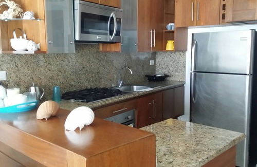 Sosua Apartment | Luxury condo on private sandy beach, with pool, A/C, internet, cable TV