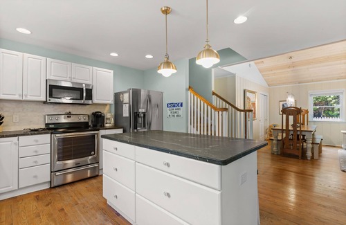Rehoboth by the Sea House | Luxury cottage, beach blk, 7BR, heated in-ground pool, firepit, linens included!