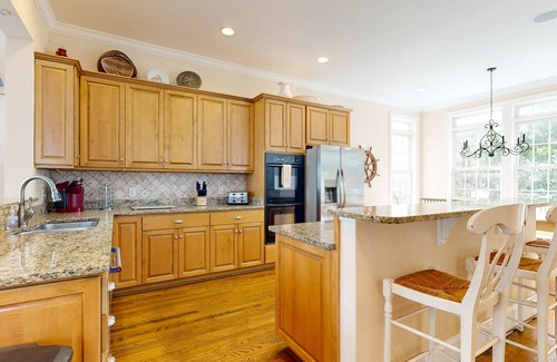 Saint Simons Island House | Luxury cottage with pools & multiple decks, 1/2 block to beach
