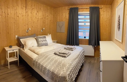 Rangarþing ytra Cottage | Luxury cottage with hot tub and large patio in quiet countryside. Great for 4-6
