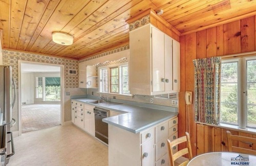 Colonial Pine Hills House | Luxury Creekside Icon