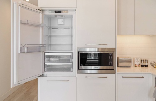 Lower Mount Royal Apartment | Luxury Downtown Suite w/Balcony Views, Air Conditioning + Free Parking