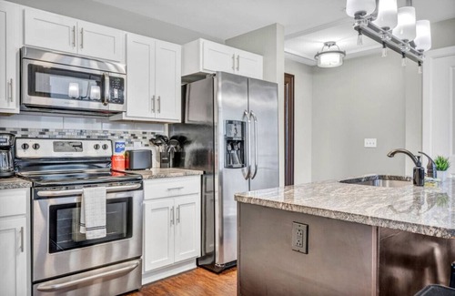 Gateway District Apartment | Luxury DT Stay | Historic Charm & Central!