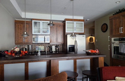 Big White Ski Resort Condo | Luxury family friendly condo with private hot tub and ski in/out to green run