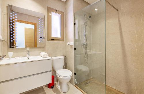 Menara Apartment | Luxury Garden-Level Apartment with Poolside Serenity
