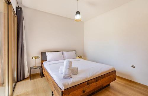 Menara Apartment | Luxury Garden-Level Apartment with Poolside Serenity