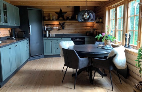 Dølemo House | Luxury hillside family home with panoramic views, sauna & hot tub
