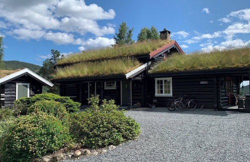Dølemo House | Luxury hillside family home with panoramic views, sauna & hot tub