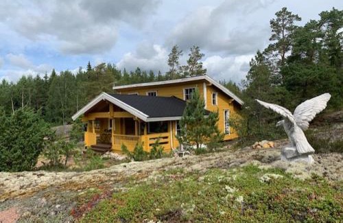 Vehmaa House | Luxury Holiday Home with Private Lake