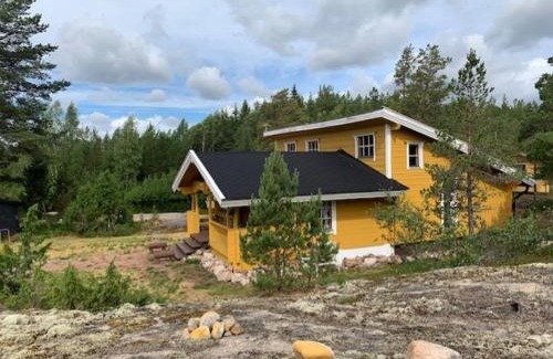 Vehmaa House | Luxury Holiday Home with Private Lake