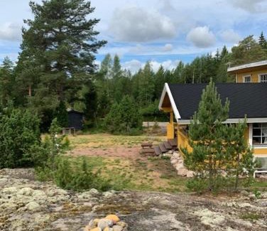 Vehmaa House | Luxury Holiday Home with Private Lake