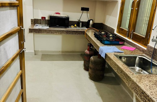 Faizabad House | Luxury king-size room with Balcony in Ayodhya. 10 minutes from Ram Mandir!