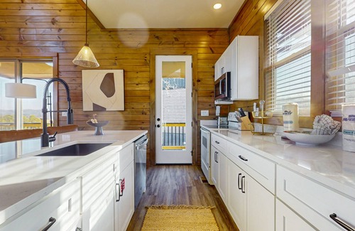 Sevierville Cabin | Luxury lakefront home with private pool, hot tub, & free attraction tickets