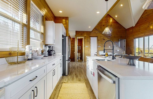 Sevierville Cabin | Luxury lakefront home with private pool, hot tub, & free attraction tickets