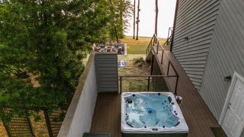 Macon Villa | Luxury Lakefront Retreat-Secluded, Hot Tub, Dock, Sunset View
