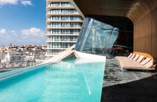 Paceville Apartment | Luxury Little Gem Mercury Tower with Rooftop Pool By Arcobnb