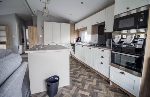Felixstowe House | Luxury lodge with decking at Suffolk Sands Holiday Park ref 45025EV