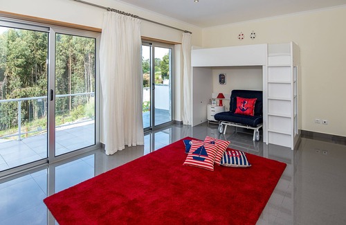 Foz do Arelho Villa | Luxury modern family villa with lagoon views, private heated pool, free wifi